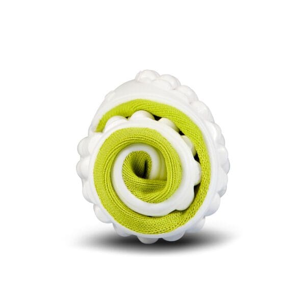 A roll of pastry with green and white icing.