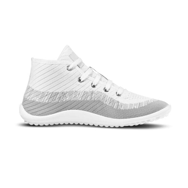 A white and gray sneaker shoe on a white background