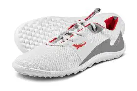 White minimalist running shoes with red accents.