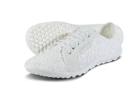 White athletic shoes with intricate design.
